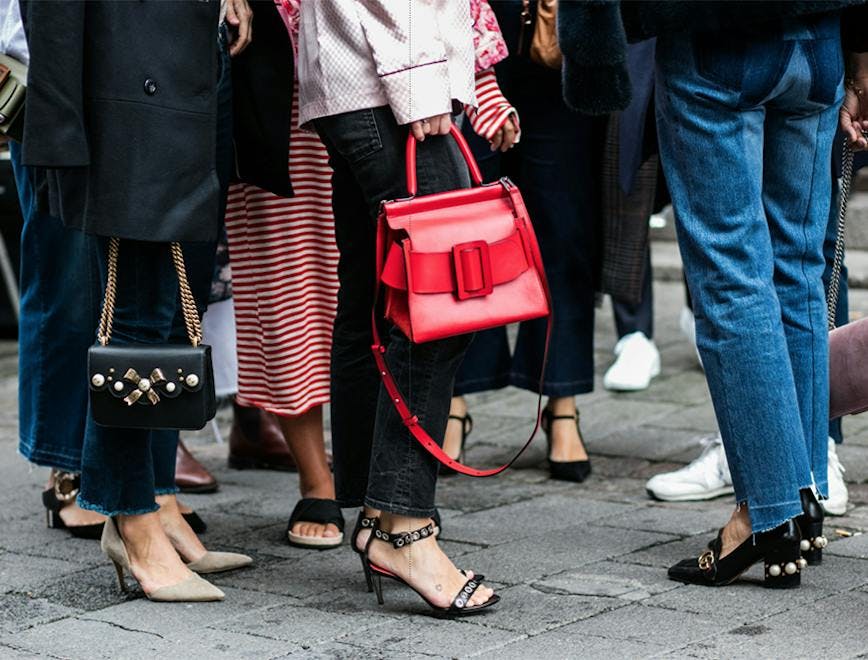 clothing apparel shoe footwear person pants handbag accessories bag purse