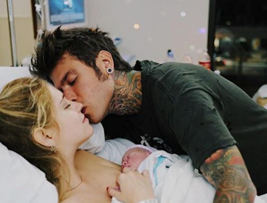 person human newborn baby skin tattoo kissing kiss
