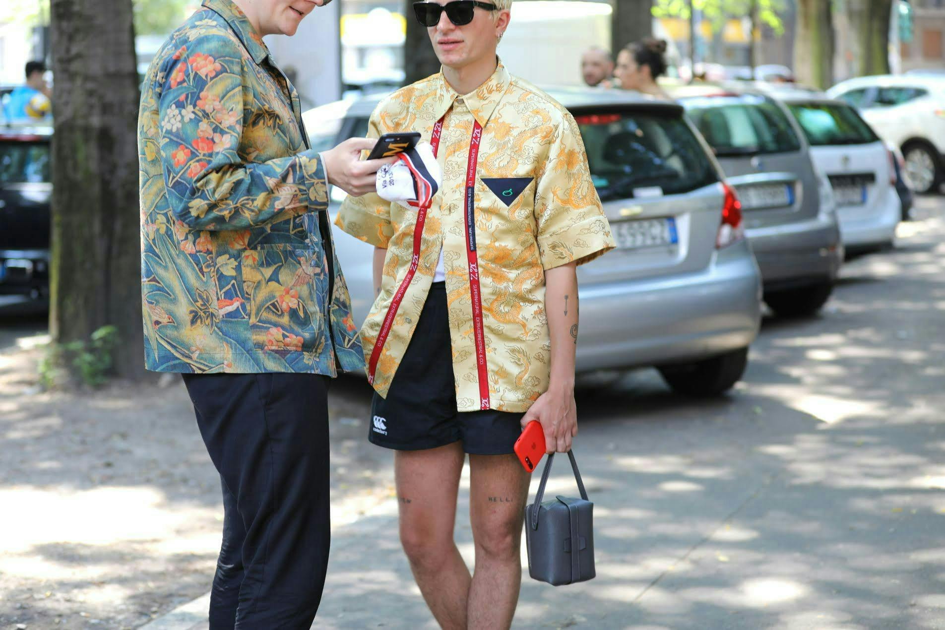 person clothing sunglasses accessories shorts car transportation sleeve wheel machine