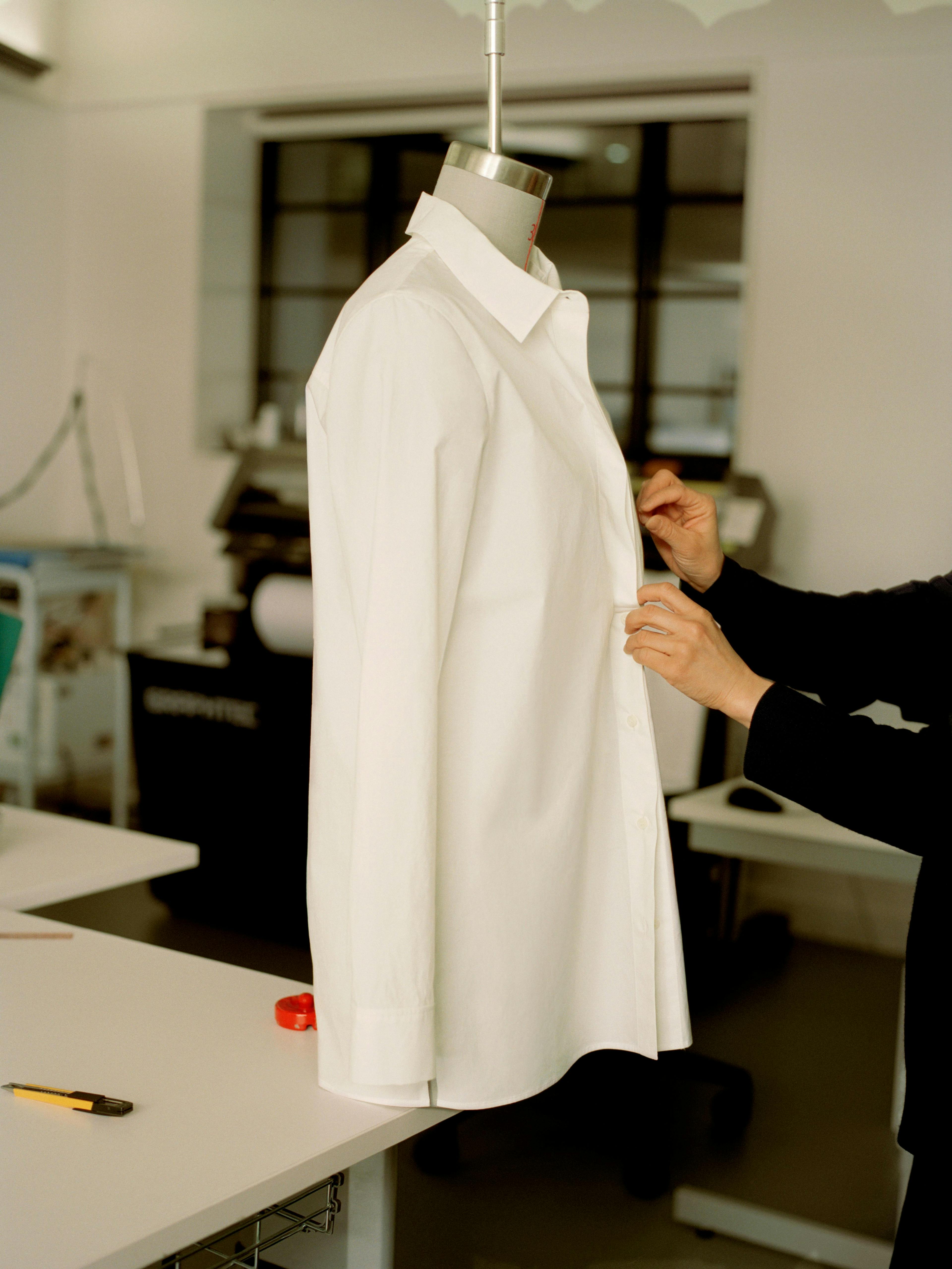 clothing apparel person human coat fashion sleeve
